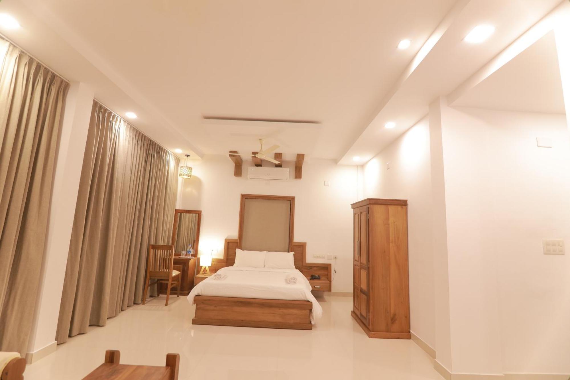 Opm Inn Payyannur Exterior photo